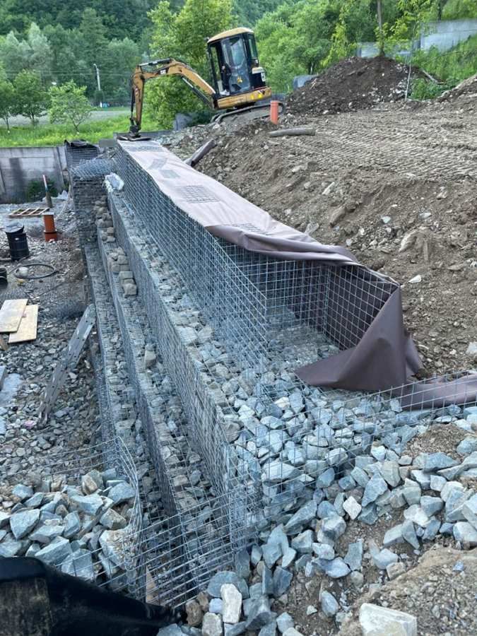 Gabion retaining wall under construction