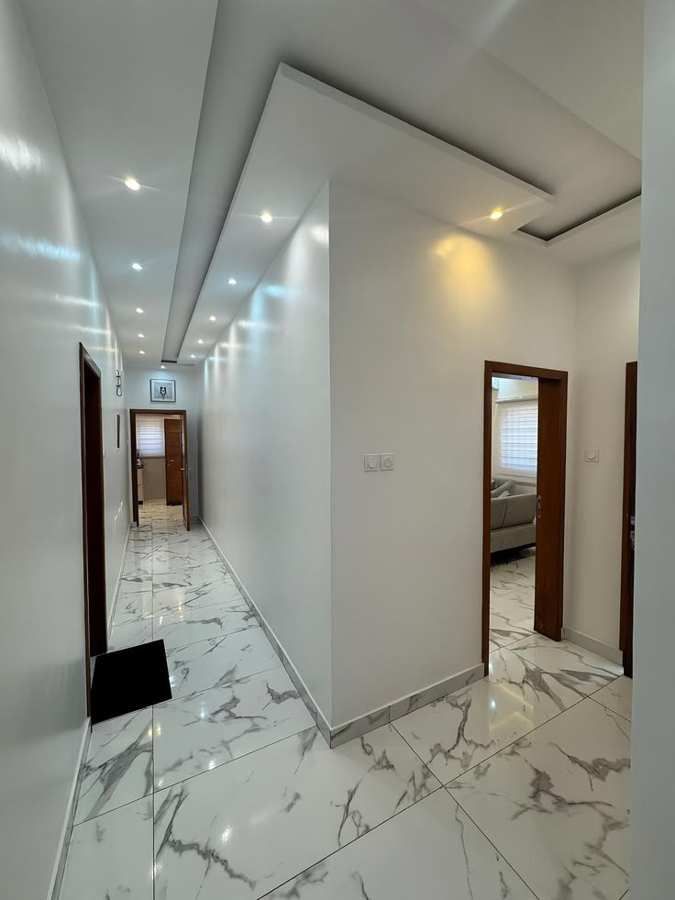Tiled corridor and finishes